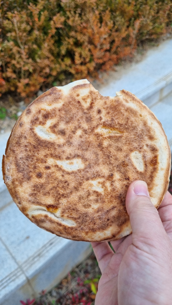 Oil-free hotteok Korean pancake with golden crispy exterior, healthier version