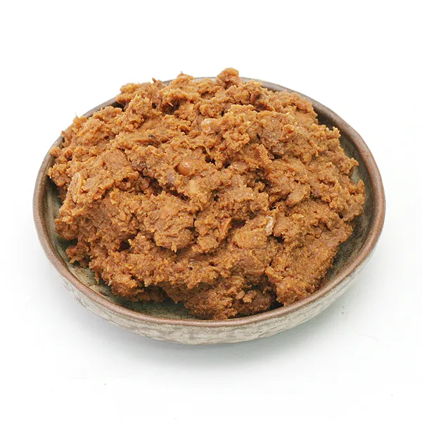 Korean doenjang fermented soybean paste showing chunky texture with visible soybean pieces