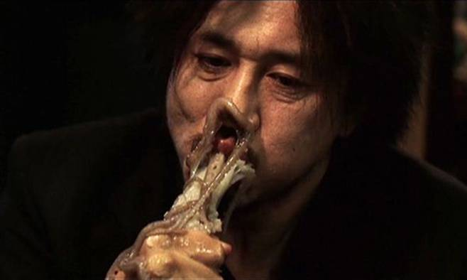 Oldboy movie scene (2003) - Choi Min-sik eating whole live octopus, the infamous scene that made sannakji globally famous