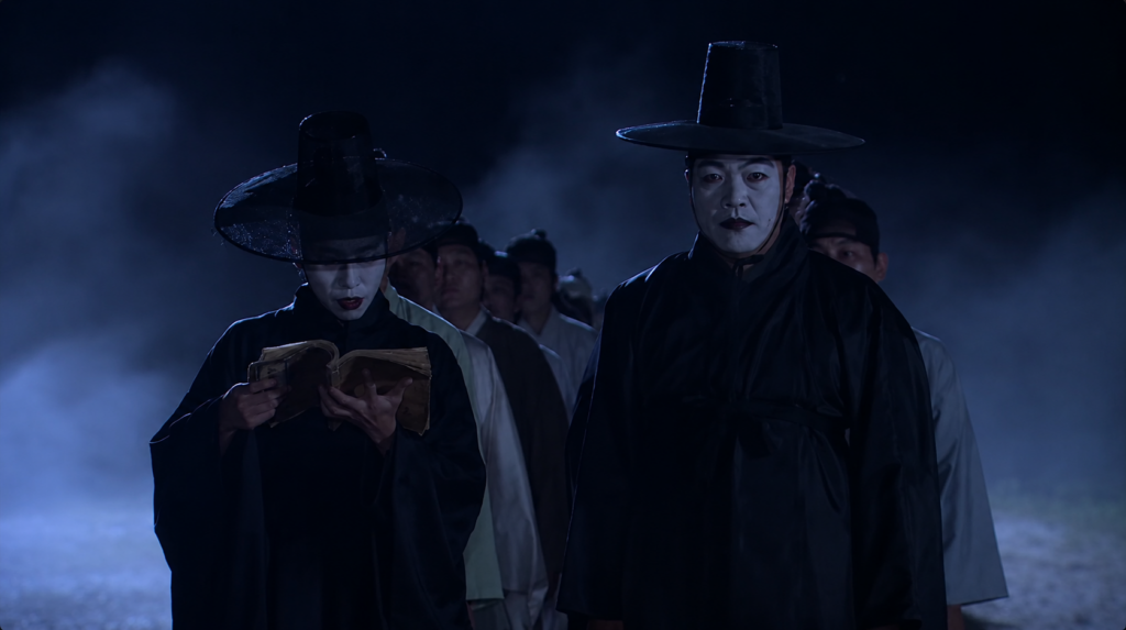 A jeoseung saja, Korea's grim reaper, holding a register in Legend of the Hometown