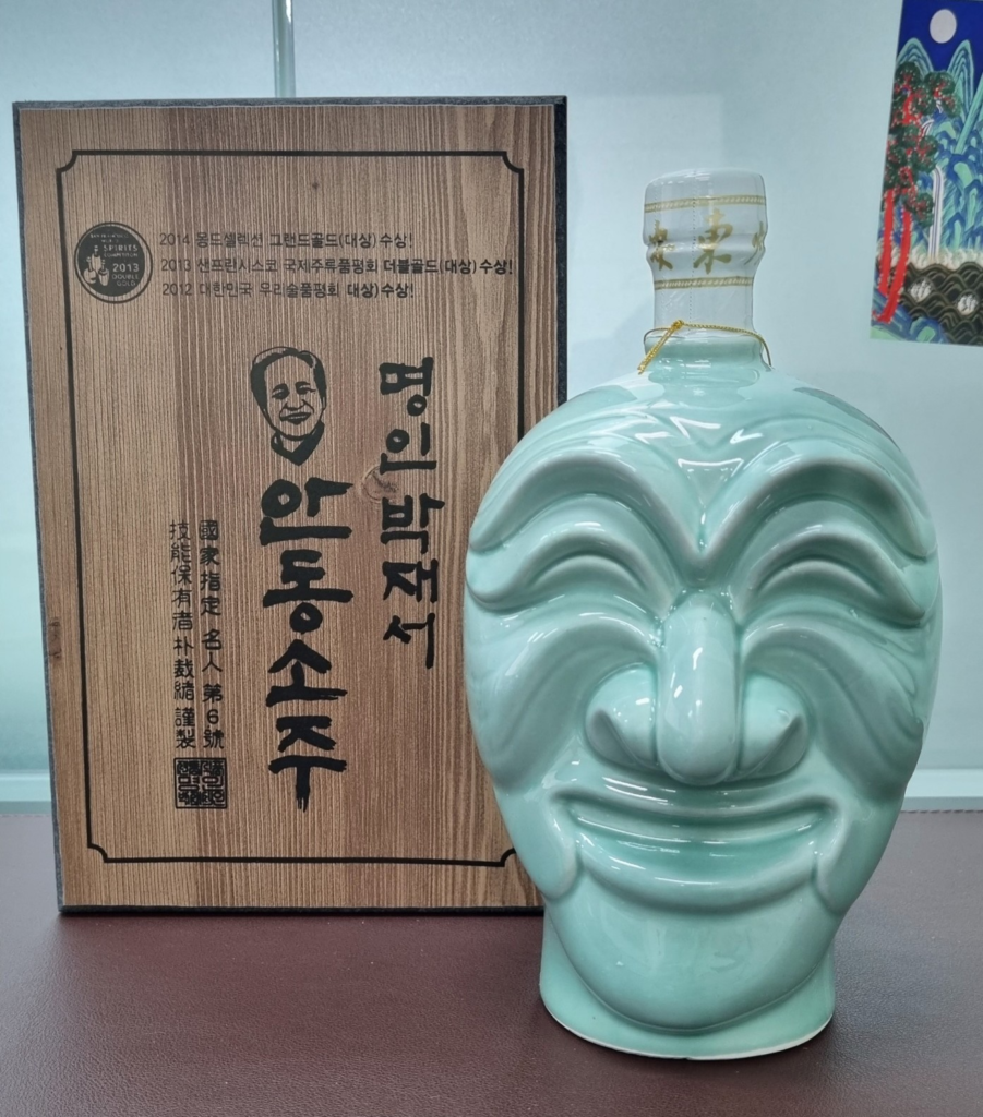 Myeongin Andong Soju in an award-winning celadon ceramic bottle shaped like a Korean traditional mask