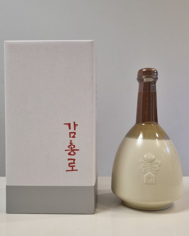 Gamhongro, a traditional Korean liquor, in a ceramic bottle beside its paper box