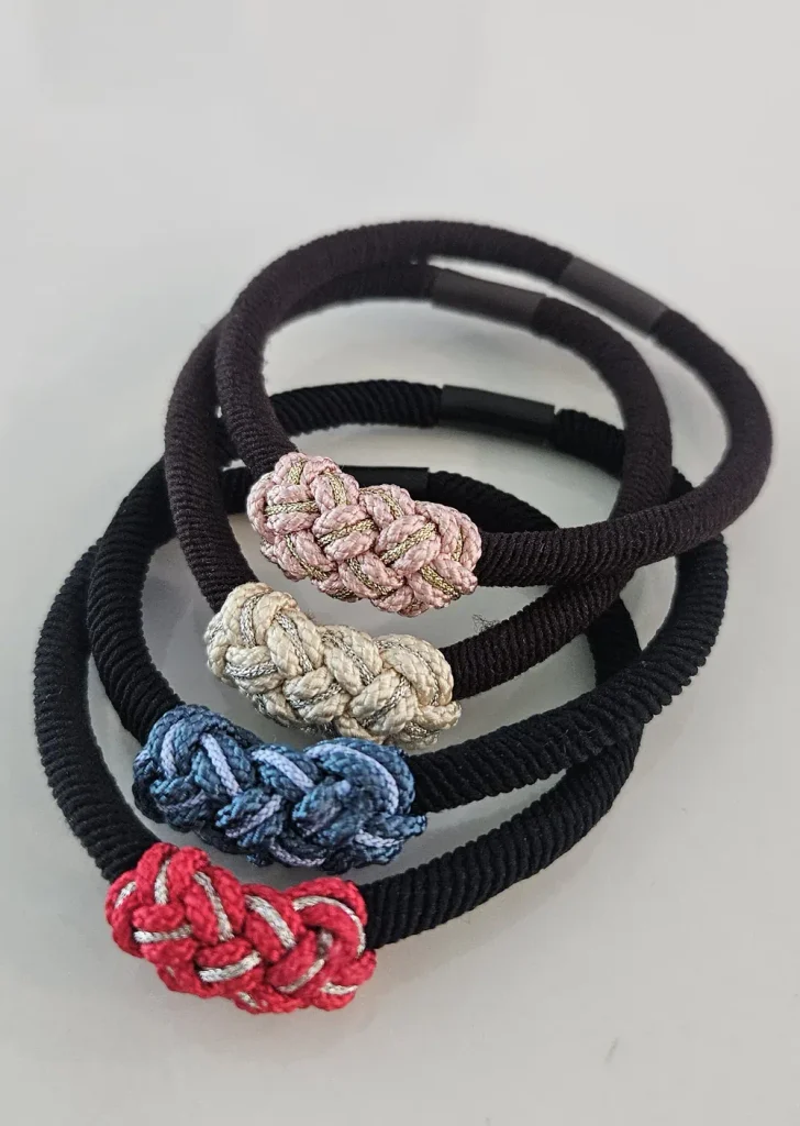 Korean maedeup knot hair ties in pink, cream, blue, and red, handcrafted in Korea