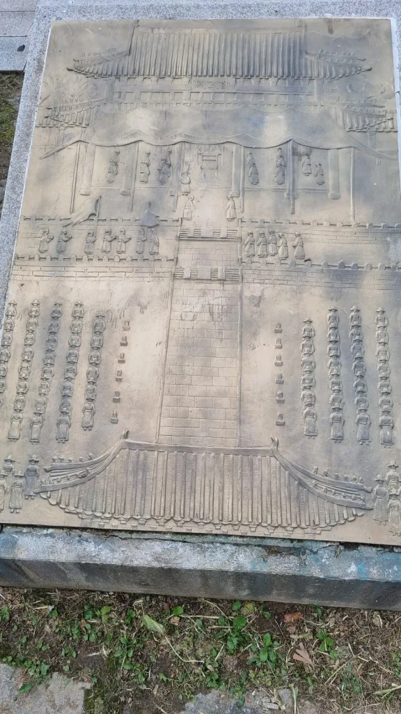 Bronze relief showing the 1446 promulgation of the Hunminjeongeum before assembled officials